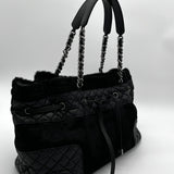 Chanel Black Quilted Aged Leather And Calfhair Drawstring Tote Bag