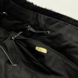 Chanel Black Quilted Aged Leather And Calfhair Drawstring Tote Bag